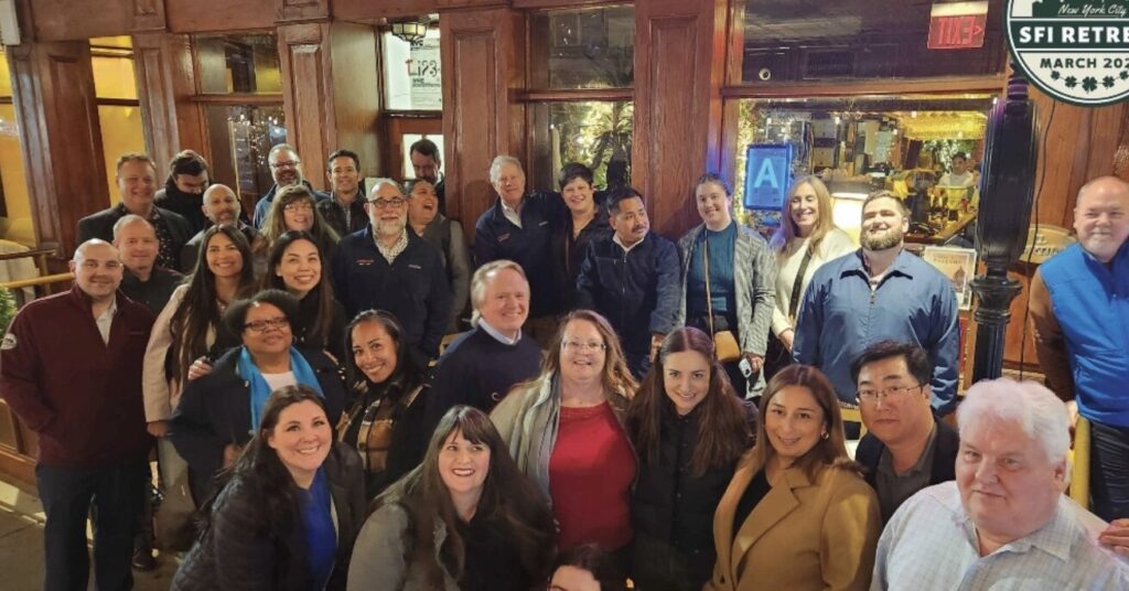 The Schreiber Foods International team gathered outside a restaurant at the company retreat in New York City